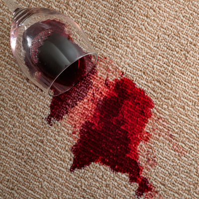 Old, set-in stain on light-colored carpet