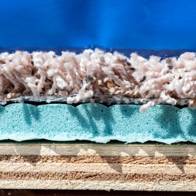 Cross-section showing carpet, padding, and subfloor