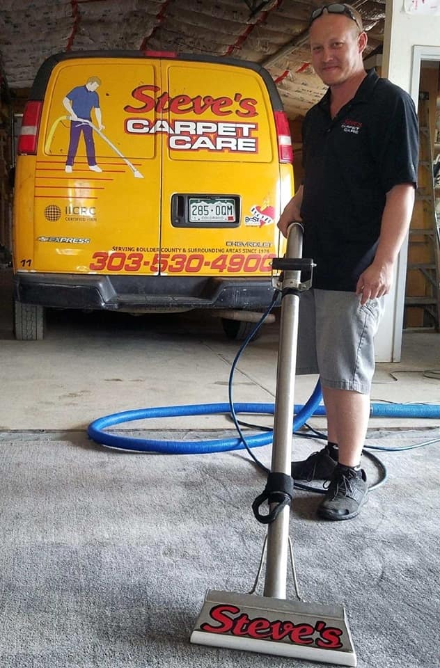 Steve's Carpet Care Employee With Truck-Mounted Steam Cleaner